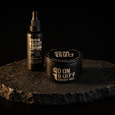 ENERGY DUO Set: Don Quiff Energy Wax und Energy Oil auf dunklem Stein