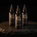 ENERGY OIL 3er Set: 3 Don Quiff Energy Oil auf dunklem Stein